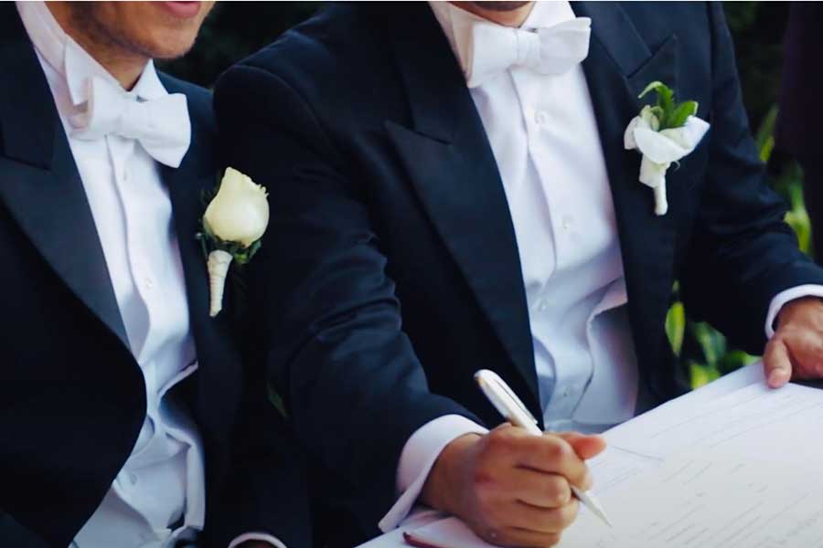 same-sex wedding signing paper