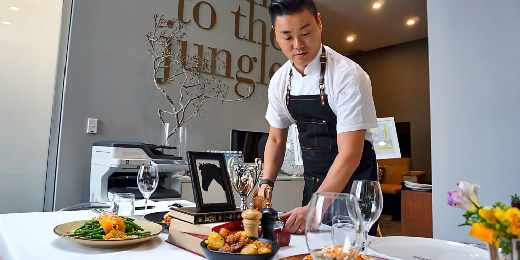 Corporate catering Chef winston cooking on site