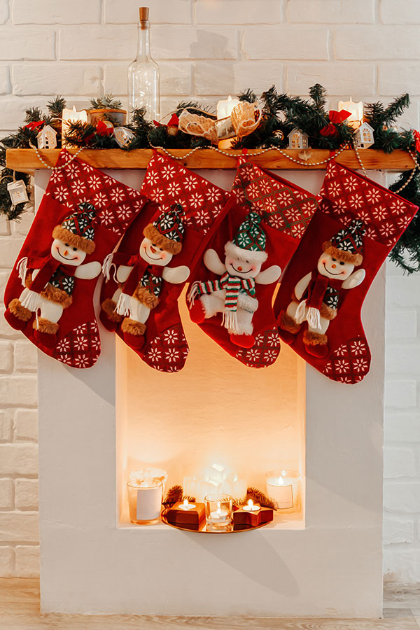 Chrismas stockings hanging on the fireplace