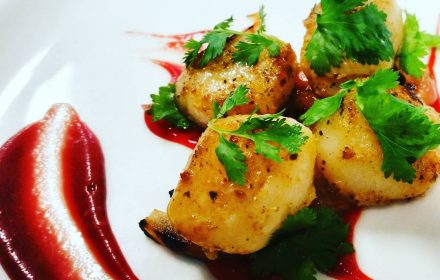Pan-seared scallop with cilantro and beetroot puree