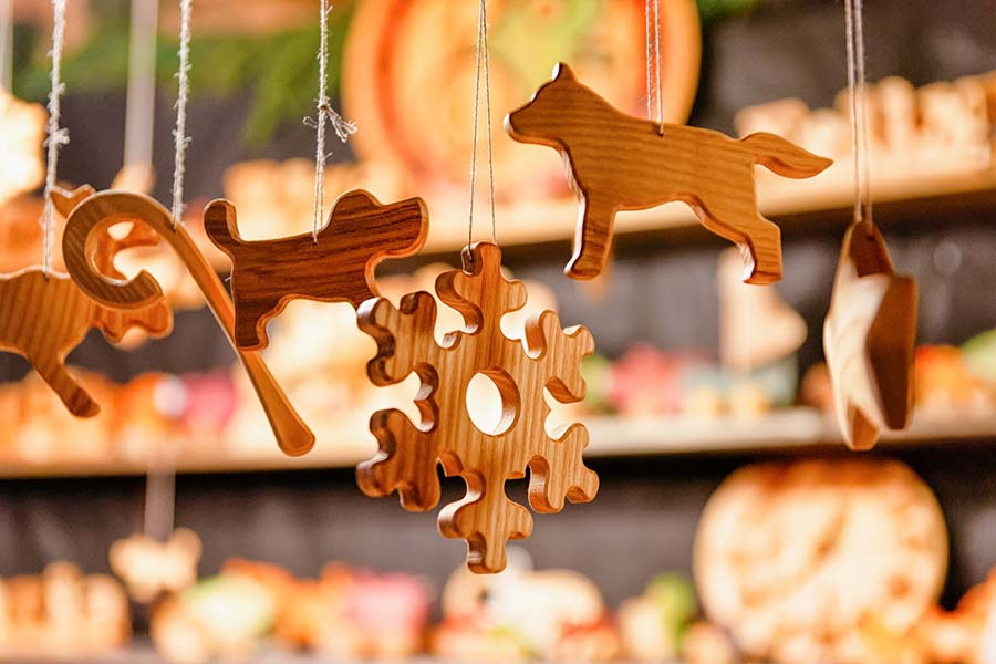 Stall with wooden toys decoration at Christmas market