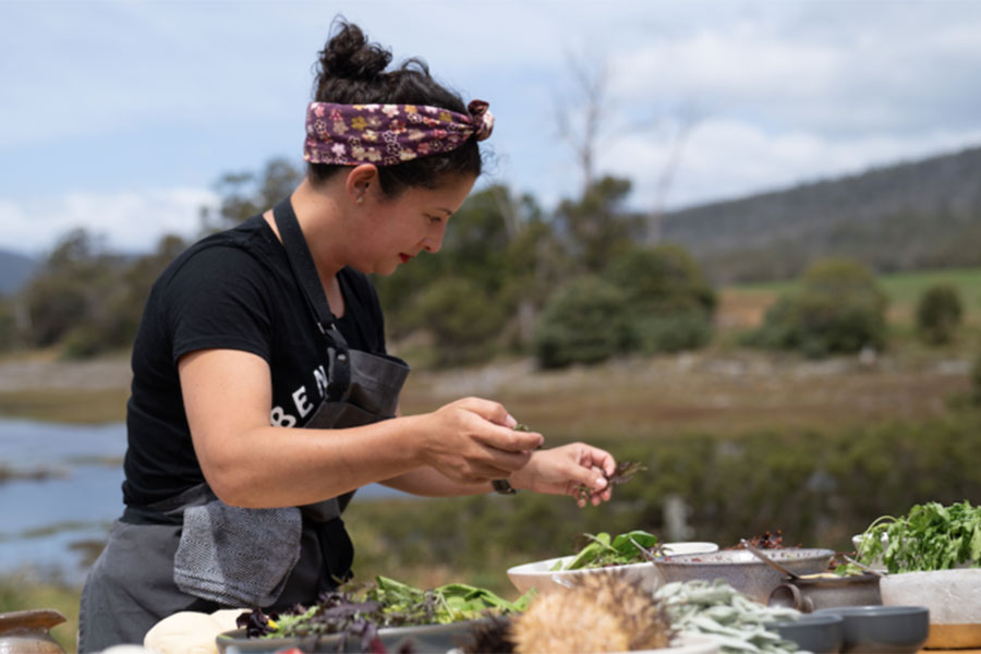 Analiese Gregory cooking in the wild