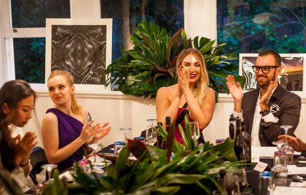 Happy guests at the table during the event delivered by private chef in Perth