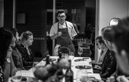 Chef Nick Guan explains his dishes to guests