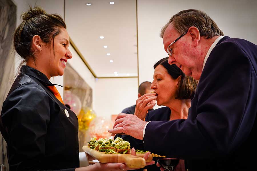 Coctail party, canapes served by waitress.