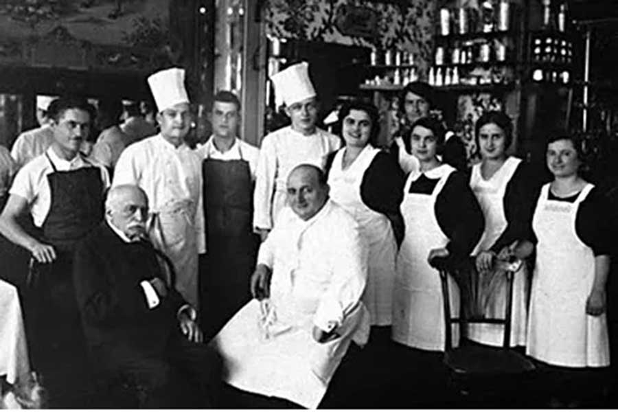 Chef Escoffier (middle) with his team