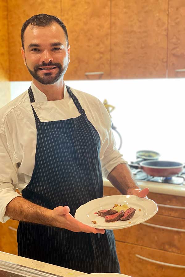 private chef Edson Marchisette cooked up a wagyu dish in a private function