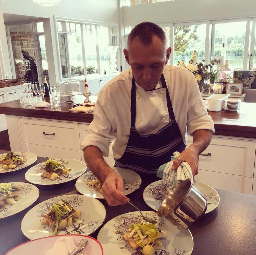 Chef Frederick Marechal plating a dish