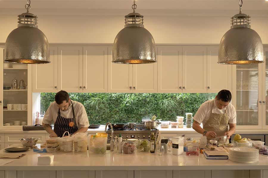 Chef Winston and Gigi prepping a home dinner