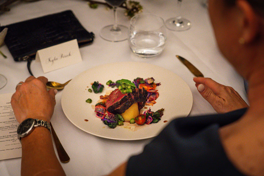 a guest is enjoying a culinary relations dinner