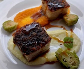 Chef Flo Carly Pork belly, parsnip, carrot puree, Brussel sprouts, orange glaze