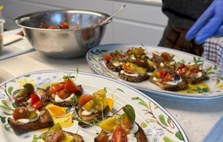 Chef Michelle Van Sittert Heirloom tomato bruschetta, whipped feta, sourdough crisp, balsamic reduction