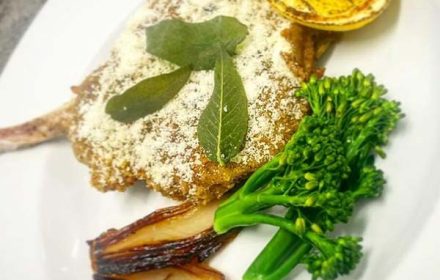 Chef Karl Nicholson Pork Cotoletta with Broccolini, Charred Lemon and Sage Butter Dish
