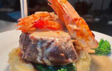 Chef Craif Wright Angus Rump Steak, Mooloolaba King Prawns, Garlic Cream Sauce Dish