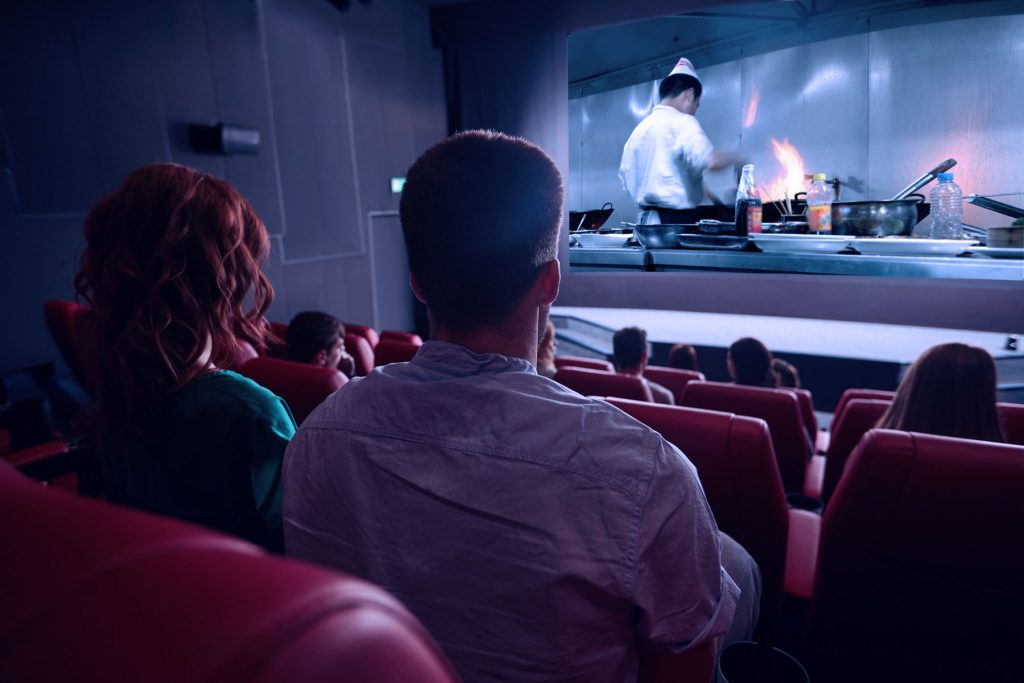 People waching chef movie in the cinema