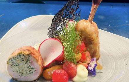 Chef Mani Bharat Chicken balotine, confit hairloom tomatoes, poached melon, leek, fennel creme, squid ink tuile