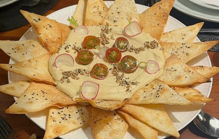 Chef Georges Dakkak Mixed olives, creamy hummus, toasted chickpeas, pita bread