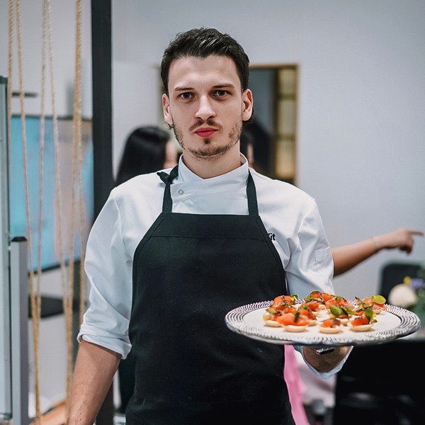 chef Vaclav Vit presenting canapés to guests