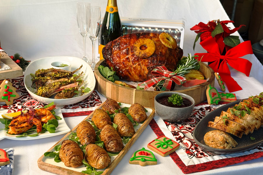 christmas menu buffet featuring glazed ham, lamb cutlets, hasselback potatoes