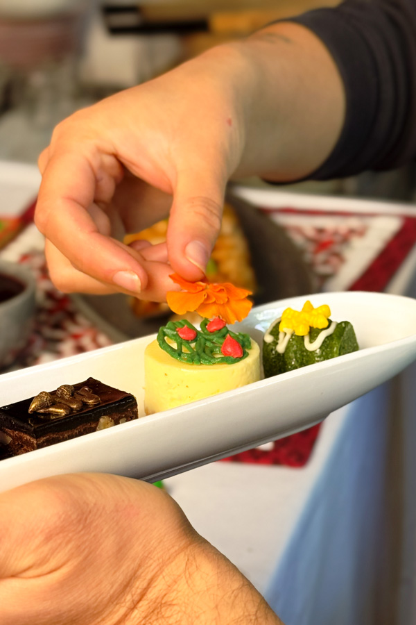 decorating petit fours with orange editable flower